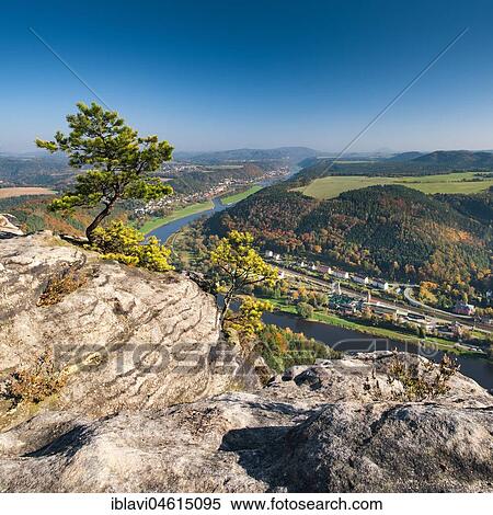 View from Lilienstein to the Elbe river, cripple pine on sandstone cliffs, Elbe valley, Elbe sandstone mountains, Saxon Switzerland National Park, Saxony, Germany, Europe View Large Photo Image Stock Photography - View from Lilienstein to the Elbe river, cripple pine on sandstone cliffs, Elbe valley, Elbe sandstone mountains, Saxon Switzerland National Park, Saxony, Germany, Europe. Fotosearch