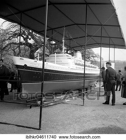 Visitors look at the model of a cruise ship exhibited around 1950, Freiburg, Germany, Europe View Large Photo Image Stock Image - Visitors look at the model of a cruise ship exhibited around 1950, Freiburg, Germany, Europe. Fotosearch