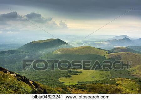 Volcanic landscape of Regional Nature Park of the Volcanoes of Auvergne, seen from the top of Puy de Dome volcano, Puy de Dome, Auvergne, France, Europe View Large Photo Image Stock Image - Volcanic landscape of Regional Nature Park of the Volcanoes of Auvergne, seen from the top of Puy de Dome volcano, Puy de Dome, Auvergne, France, Europe. Fotosearch