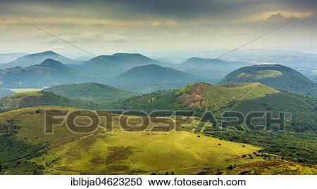 Volcanic landscape of Regional Nature Park of the Volcanoes of Auvergne, seen from the top of Puy de Dome volcano, Puy de Dome, Auvergne, France, Europe View Large Photo Image Stock Image - Volcanic landscape of Regional Nature Park of the Volcanoes of Auvergne, seen from the top of Puy de Dome volcano, Puy de Dome, Auvergne, France, Europe. Fotosearch