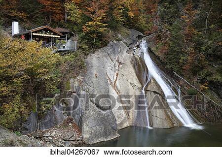 Waterfall at the lower entrance to Starzlachklamm, autumn mood, Winkel near Sonthofen, Oberallgau, Oberallgau district, Bavaria, Germany, Europe View Large Photo Image Stock Photo - Waterfall at the lower entrance to Starzlachklamm, autumn mood, Winkel near Sonthofen, Oberallgau, Oberallgau district, Bavaria, Germany, Europe. Fotosearch