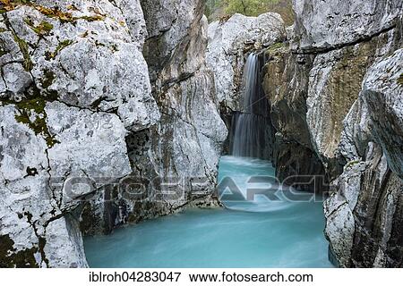Stock Photo - Waterfall in Soca Canyon, Soca Valley, Bovec, Triglav National Park, Slovenia, Europe. Fotosearch