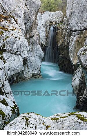Stock Photo - Waterfall in Soca Canyon, Soca Valley, Bovec, Triglav National Park, Slovenia, Europe. Fotosearch