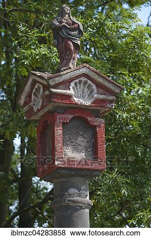 Stock Photo - Wegmarterl, wayside shrine in front of the Cistercian Abbey, Stift St. Marienthal on the Neisse, Oberlausitz, Saxony, Germany, Europe. Fotosearch