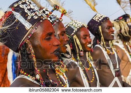 Picture - Wodaabe-Bororo men with faces painted at the annual Gerewol festival, courtship ritual competition among the Woodaabe Fula people, Niger, Africa. Fotosearch