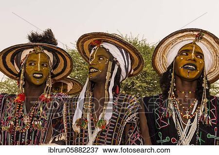 Wodaabe-Bororo men with faces painted at the annual Gerewol festival, courtship ritual competition among the Woodaabe Fula people, Niger, Africa View Large Photo Image Stock Photo - Wodaabe-Bororo men with faces painted at the annual Gerewol festival, courtship ritual competition among the Woodaabe Fula people, Niger, Africa. Fotosearch