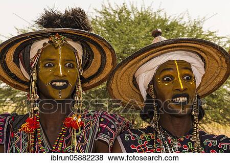 Wodaabe-Bororo men with faces painted at the annual Gerewol festival, courtship ritual competition among the Woodaabe Fula people, Niger, Africa View Large Photo Image Stock Photo - Wodaabe-Bororo men with faces painted at the annual Gerewol festival, courtship ritual competition among the Woodaabe Fula people, Niger, Africa. Fotosearch