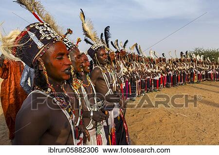 Wodaabe-Bororo men with faces painted at the annual Gerewol festival, courtship ritual competition among the Woodaabe Fula people, Niger, Africa View Large Photo Image Stock Photograph - Wodaabe-Bororo men with faces painted at the annual Gerewol festival, courtship ritual competition among the Woodaabe Fula people, Niger, Africa. Fotosearch