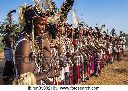 Wodaabe-Bororo men with faces painted at the annual Gerewol festival, courtship ritual competition among the Woodaabe Fula people, Niger, Africa View Large Photo Image Stock Photography - Wodaabe-Bororo men with faces painted at the annual Gerewol festival, courtship ritual competition among the Woodaabe Fula people, Niger, Africa. Fotosearch