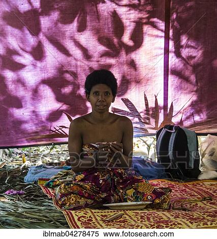 Woman, aboriginal Orang Asil, sitting in a tent in the jungle, indigenous people, tropical rainforest, Taman Negara, Malaysia, Asia View Large Photo Image Stock Photography - Woman, aboriginal Orang Asil, sitting in a tent in the jungle, indigenous people, tropical rainforest, Taman Negara, Malaysia, Asia. Fotosearch