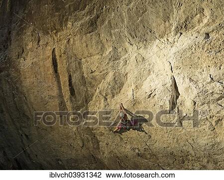 Woman climbing, lead climbing, on a rock face, Martinswand, Zirl, Tyrol, Austria, Europe View Large Photo Image Stock Image - Woman climbing, lead climbing, on a rock face, Martinswand, Zirl, Tyrol, Austria, Europe. Fotosearch