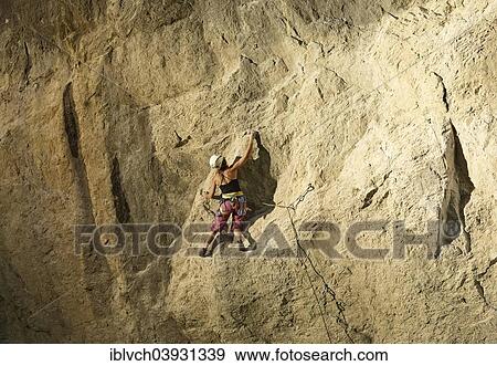 Woman climbing, lead climbing, on a rock face, Martinswand, Zirl, Tyrol, Austria, Europe View Large Photo Image Stock Photo - Woman climbing, lead climbing, on a rock face, Martinswand, Zirl, Tyrol, Austria, Europe. Fotosearch