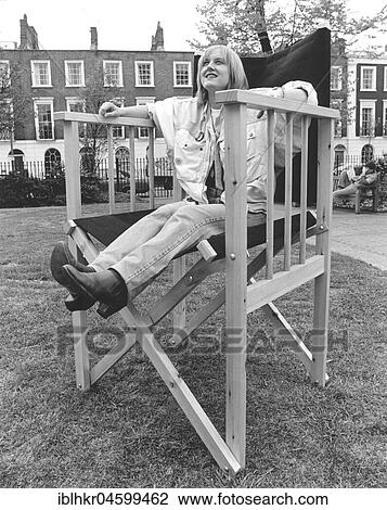 Woman in a large chair, England, Great Britain View Large Photo Image Stock Image - Woman in a large chair, England, Great Britain. Fotosearch