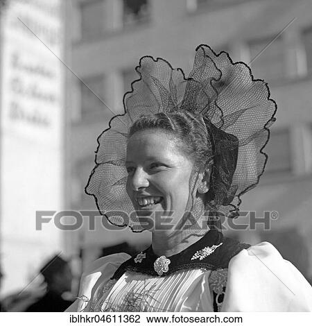 Woman in traditional traditional costume with hair ornaments, ca. 1955, near Freiburg, Germany, Europe View Large Photo Image Stock Image - Woman in traditional traditional costume with hair ornaments, ca. 1955, near Freiburg, Germany, Europe. Fotosearch
