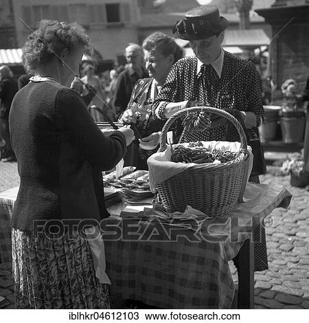 Woman selling pretzels at a market, Freiburger Münstermarkt, approx. 1945 to 1955, Freiburg, Germany, Europe View Large Photo Image Stock Image - Woman selling pretzels at a market, Freiburger Münstermarkt, approx. 1945 to 1955, Freiburg, Germany, Europe. Fotosearch