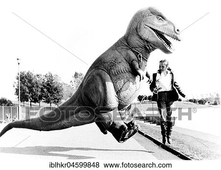 Woman strolling with Dino, England, Great Britain View Large Photo Image Stock Photo - Woman strolling with Dino, England, Great Britain. Fotosearch