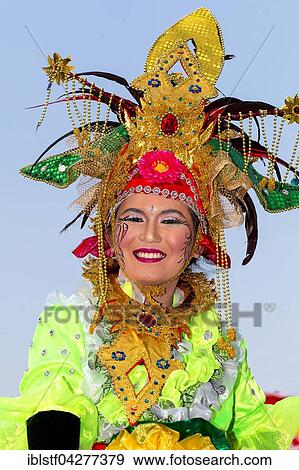 Woman with headdress and costume, National Day parade, Klaten, Central Java, Java Island, Indonesia, Asia View Large Photo Image Stock Photo - Woman with headdress and costume, National Day parade, Klaten, Central Java, Java Island, Indonesia, Asia. Fotosearch