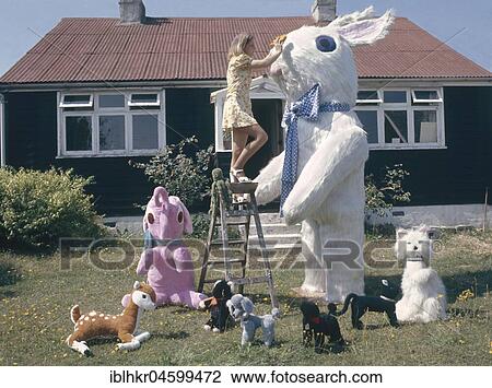 Woman with soft toys, England, Great Britain View Large Photo Image Stock Image - Woman with soft toys, England, Great Britain. Fotosearch