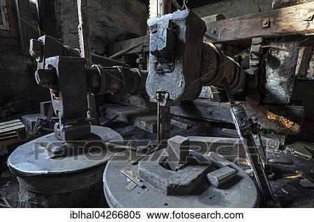 Stock Photography - Workshop with hammer, old hammer mill at the Ostrach, Obere Hammerschmiede, Bad Oberdorf in Bad Hindelang, Allgau, Bavaria, Germany, Europe. Fotosearch