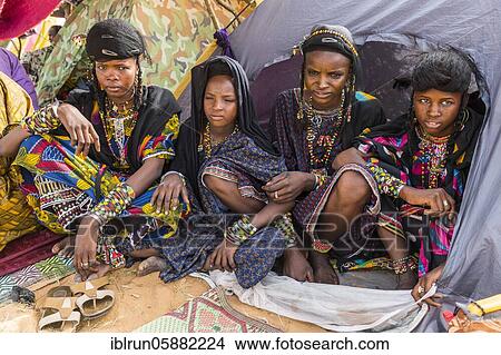 Picture - Young girls at the Gerewol festival, courtship ritual competition among the Woodaabe Fula people, Niger, Africa. Fotosearch