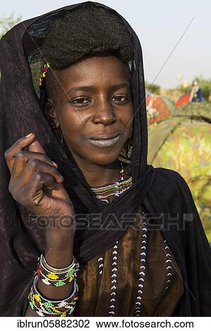 Young girls at the Gerewol festival, courtship ritual competition among the Woodaabe Fula people, Niger, Africa View Large Photo Image Stock Image - Young girls at the Gerewol festival, courtship ritual competition among the Woodaabe Fula people, Niger, Africa. Fotosearch