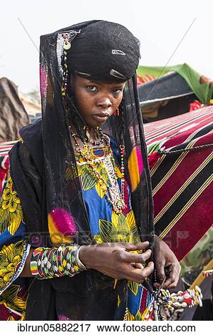 Young girls at the Gerewol festival, courtship ritual competition among the Woodaabe Fula people, Niger, Africa View Large Photo Image Stock Photo - Young girls at the Gerewol festival, courtship ritual competition among the Woodaabe Fula people, Niger, Africa. Fotosearch