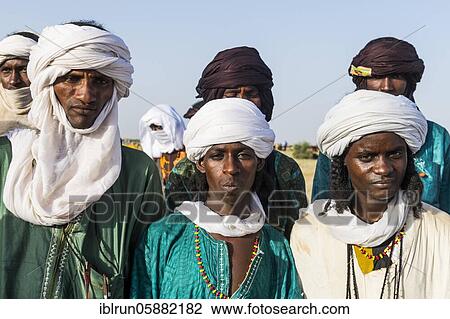Young men arriving for the Gerewol festival, courtship ritual competition among the Woodaabe Fula people, Niger, Africa View Large Photo Image Stock Image - Young men arriving for the Gerewol festival, courtship ritual competition among the Woodaabe Fula people, Niger, Africa. Fotosearch