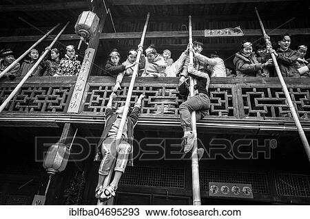 Young people preparing a production in which they rob unmarried woman from a balcony, Ping'An, Zhangjiajie National Forest Park, China, Asia View Large Photo Image Stock Image - Young people preparing a production in which they rob unmarried woman from a balcony, Ping'An, Zhangjiajie National Forest Park, China, Asia. Fotosearch