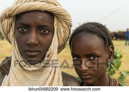 Young peul men, Gerewol festival, courtship ritual competition among the Woodaabe Fula people, Niger, Africa View Large Photo Image Stock Photo - Young peul men, Gerewol festival, courtship ritual competition among the Woodaabe Fula people, Niger, Africa. Fotosearch
