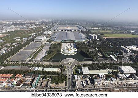Stock Image - Aerial view of the Dhammakaya complex with the Wat Phra Dhammakaya Temple, Khlong Luang District, Pathum Thani, Bangkok, Thailand, Asia *** IMPORTANT: Image may not be used in a negative context with the Dhammakaya temple ***. Fotosearch