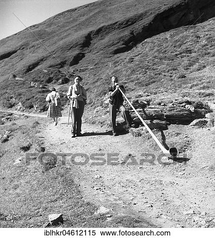 Stock Photography - Alphorn blowers ca. 1950, Switzerland, Europe. Fotosearch