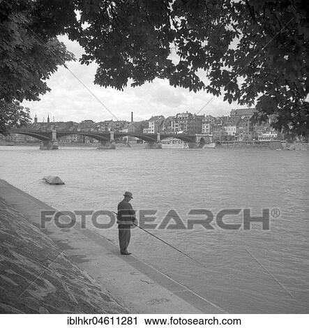 Stock Image - Angler an der Dreisam, ca. 1950, Freiburg, Germany, Europe. Fotosearch