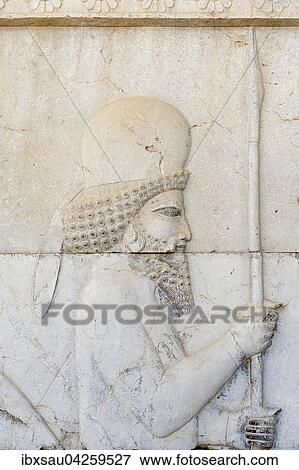 Antikes Relief der Achameniden, Meder mit Lanze, Soldat der unsterblichen Garde, Aussenmauer des Apadana, Palast, archaologische Ausgrabungsstatte, altpersische Residenzstadt Persepolis, UNESCO Weltkulturerbe, Provinz Fars, Iran View Large Photo Image Stock Photo - Antikes Relief der Achameniden, Meder mit Lanze, Soldat der unsterblichen Garde, Aussenmauer des Apadana, Palast, archaologische Ausgrabungsstatte, altpersische Residenzstadt Persepolis, UNESCO Weltkulturerbe, Provinz Fars, Iran. Fotosearch