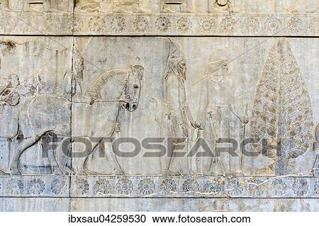 Antikes Relief der Achameniden, Delegation der Skythen mit Soldat der unsterblichen Garde, Apadana, Palast, altpersische Residenzstadt Persepolis, UNESCO Weltkulturerbe, Provinz Fars, Iran View Large Photo Image Stock Image - Antikes Relief der Achameniden, Delegation der Skythen mit Soldat der unsterblichen Garde, Apadana, Palast, altpersische Residenzstadt Persepolis, UNESCO Weltkulturerbe, Provinz Fars, Iran. Fotosearch
