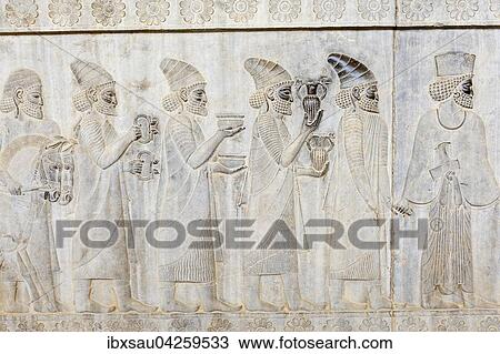 Antikes Relief der Achameniden, Delegation der Lyder geleitet von Soldat der unsterblichen Garde, Apadana, Palast, altpersische Residenzstadt Persepolis, UNESCO Weltkulturerbe, Provinz Fars, Iran View Large Photo Image Stock Image - Antikes Relief der Achameniden, Delegation der Lyder geleitet von Soldat der unsterblichen Garde, Apadana, Palast, altpersische Residenzstadt Persepolis, UNESCO Weltkulturerbe, Provinz Fars, Iran. Fotosearch