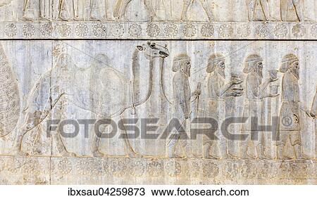 Stock Image - Antikes Relief der Achameniden, Delegation der Parther mit Kamel, Apadana, Palast, archaologische Ausgrabungsstatte, altpersische Residenzstadt Persepolis, UNESCO Weltkulturerbe, Provinz Fars, Iran. Fotosearch