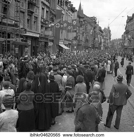 Stock Photography - Approx. 1939, 1941, original caption: Homecoming troops, swastika flags, Freiburg, Germany, Europe. Fotosearch
