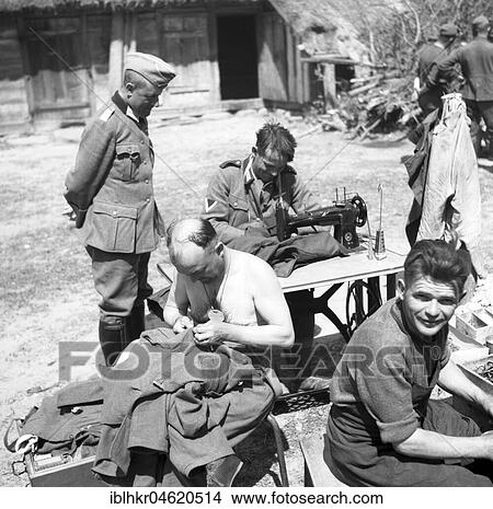 Approx. 1939, 1941, training Wehrmacht, soldiers sewing their clothes, Ulm, Germany, Europe View Large Photo Image Picture - Approx. 1939, 1941, training Wehrmacht, soldiers sewing their clothes, Ulm, Germany, Europe. Fotosearch
