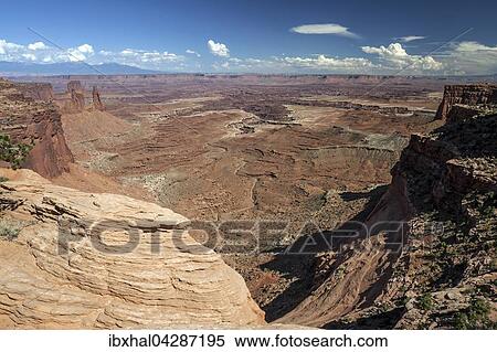 Ausblick beim Mesa Arch auf Erosionslandschaft, Felsformationen, hinten Buck Canyon, Island in the Sky, Canyonlands-Nationalpark, Utah, USA, Nordamerika View Large Photo Image Stock Photography - Ausblick beim Mesa Arch auf Erosionslandschaft, Felsformationen, hinten Buck Canyon, Island in the Sky, Canyonlands-Nationalpark, Utah, USA, Nordamerika. Fotosearch