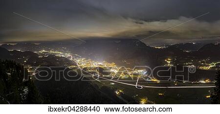 Stock Image - Ausblick ins Inntal mit Kufstein, Nachtaufnahme, hinten Kaisergebirge, Kufstein, Tirol, Osterreich, Europa. Fotosearch