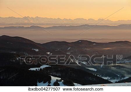 Ausblick vom Belchen im Winter auf die Schweizer Alpen, Alpenkette, Schwarzwald, Baden-Wurttemberg, Deutschland, Europa View Large Photo Image Stock Photo - Ausblick vom Belchen im Winter auf die Schweizer Alpen, Alpenkette, Schwarzwald, Baden-Wurttemberg, Deutschland, Europa. Fotosearch