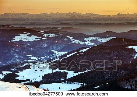 Ausblick vom Belchen im Winter auf die Schweizer Alpen, Alpenkette, Abendrot, Schwarzwald, Baden-Wurttemberg, Deutschland, Europa View Large Photo Image Stock Photo - Ausblick vom Belchen im Winter auf die Schweizer Alpen, Alpenkette, Abendrot, Schwarzwald, Baden-Wurttemberg, Deutschland, Europa. Fotosearch