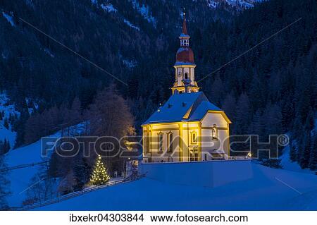Beleuchtete Bergkirche am Abend mit Schnee, Obernberger Kirche, Obernbergtal, Tirol, Osterreich, Europa View Large Photo Image Picture - Beleuchtete Bergkirche am Abend mit Schnee, Obernberger Kirche, Obernbergtal, Tirol, Osterreich, Europa. Fotosearch