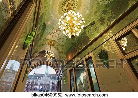 Beurspassage Amsterdam, passageway with mosaics and chandeliers, artwork Arno and Iris and Hans von Bentem, Damrak, Amsterdam, Holland, Netherlands View Large Photo Image Stock Image - Beurspassage Amsterdam, passageway with mosaics and chandeliers, artwork Arno and Iris and Hans von Bentem, Damrak, Amsterdam, Holland, Netherlands. Fotosearch