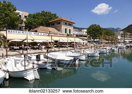 Boats in the harbour of Port Soller, Majorca, Balearic Islands, Spain, Europe View Large Photo Image Stock Photo - Boats in the harbour of Port Soller, Majorca, Balearic Islands, Spain, Europe. Fotosearch