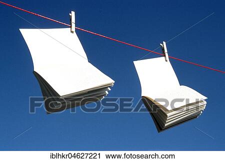 Stock Image - Books on the clothesline, Berlin, Germany, Europe. Fotosearch