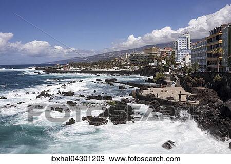 Brandung an der Uferpromenade, hinten Badelandschaft Playa de Martianez von Cesar Manrique, San Telmo, Puerto De La Cruz, Teneriffa, Kanarische Inseln, Spanien, Europa View Large Photo Image Stock Image - Brandung an der Uferpromenade, hinten Badelandschaft Playa de Martianez von Cesar Manrique, San Telmo, Puerto De La Cruz, Teneriffa, Kanarische Inseln, Spanien, Europa. Fotosearch
