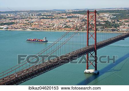 Bridge of April 25th, Ponte 25 de Abril over the river Tejo, Lisbon, Portugal, Europe View Large Photo Image Stock Image - Bridge of April 25th, Ponte 25 de Abril over the river Tejo, Lisbon, Portugal, Europe. Fotosearch