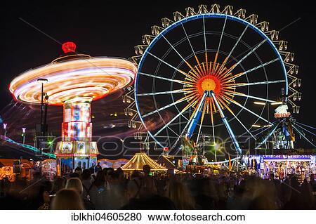 Chain carousel and Ferris wheel at night, Oktoberfest, Theresienwiese, Munich, Upper Bavaria, Germany, Europe View Large Photo Image Stock Image - Chain carousel and Ferris wheel at night, Oktoberfest, Theresienwiese, Munich, Upper Bavaria, Germany, Europe. Fotosearch