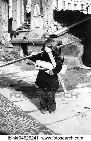 Child collects firewood, ca. 1945 Leipzig, Germany, Europe View Large Photo Image Stock Image - Child collects firewood, ca. 1945 Leipzig, Germany, Europe. Fotosearch